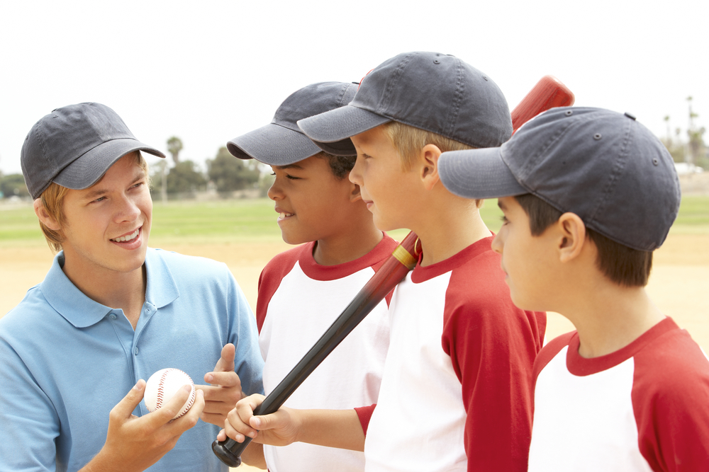 HOME young,boys,in,baseball,team,with,coach